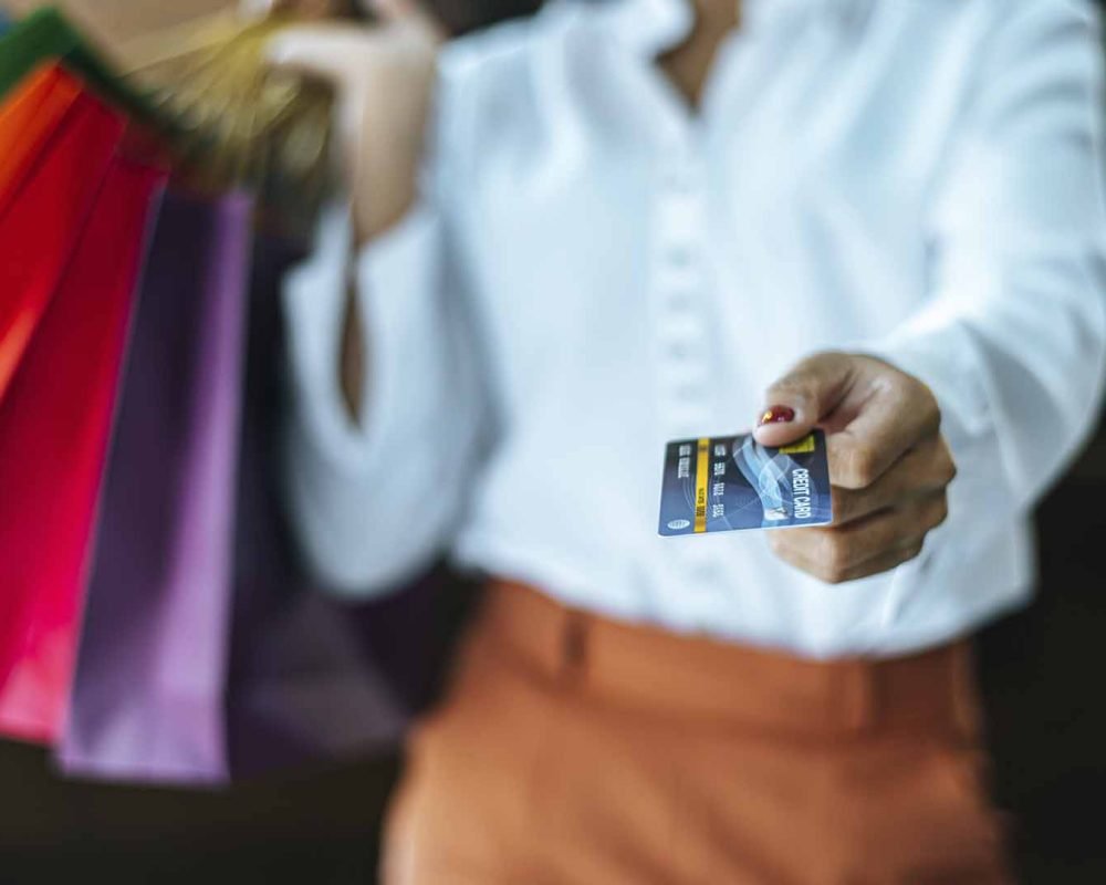 young-woman-enjoy-shopping-with-credit-cards
